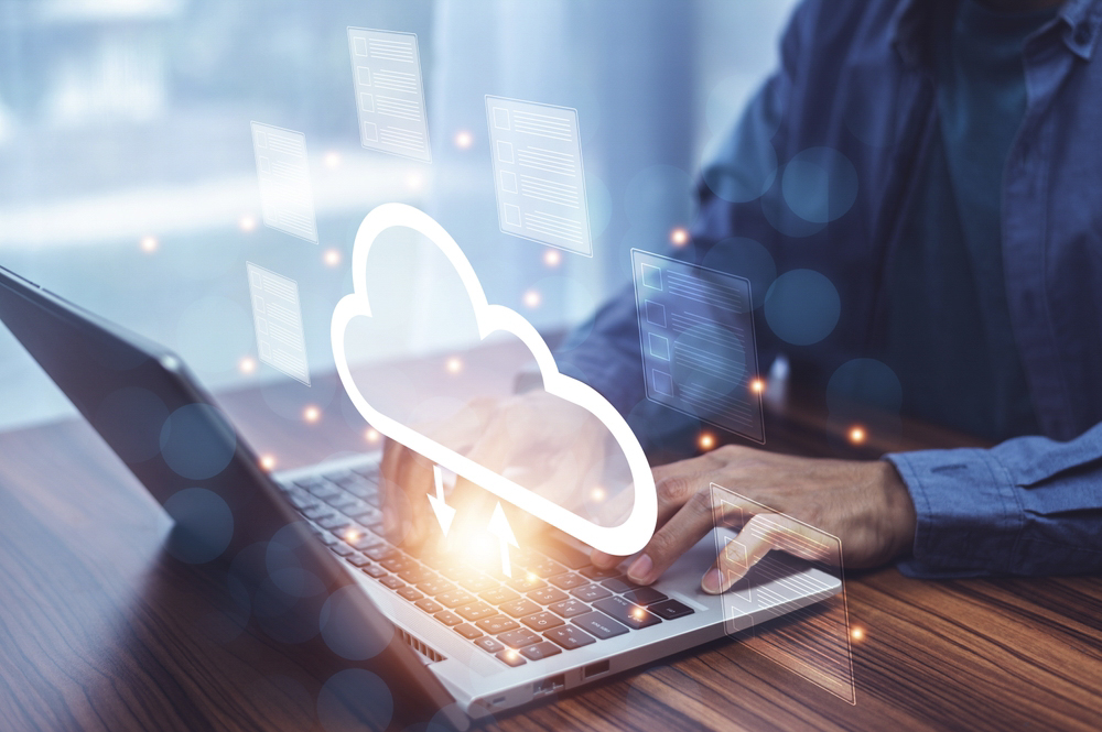 e-BO Businessman using Cloud Computer technology and storage online for computer business network ideas connected to Internet server services for cloud transfer shown in the future Network of Data.